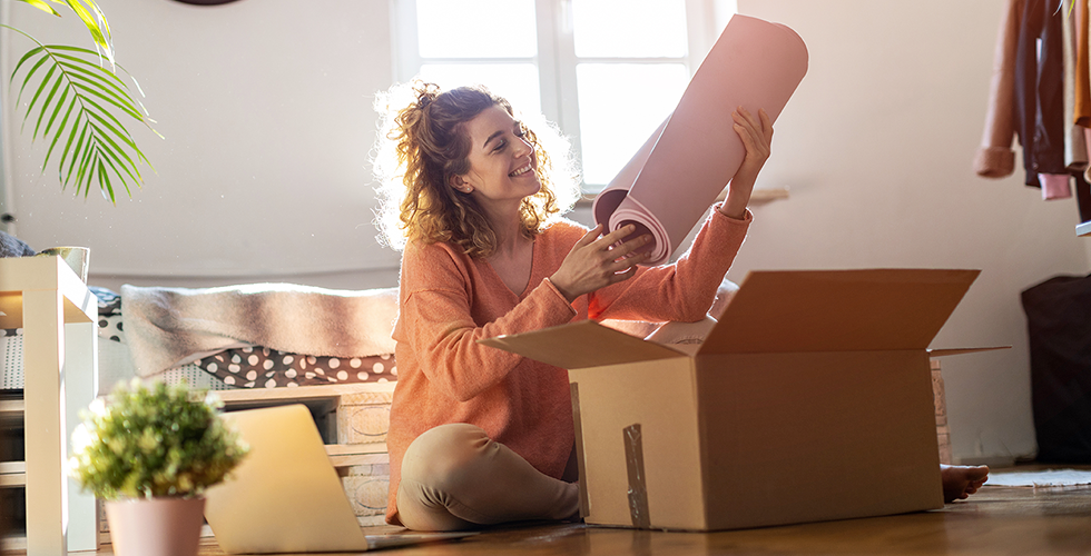 woman-unpacking-parcel